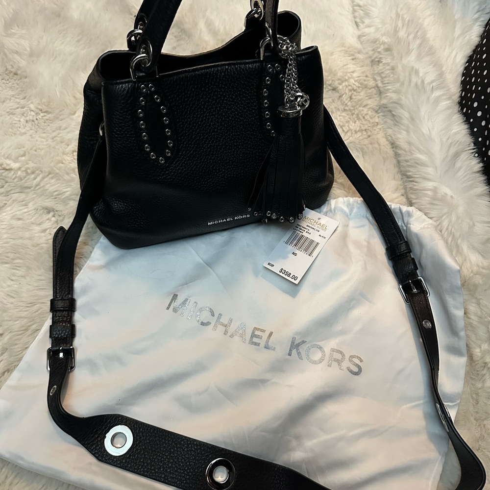 Michael Kors pebble, leather mini tote gently used kept in a dust bag